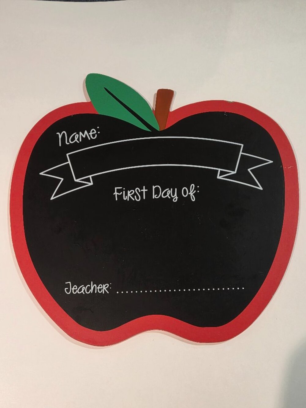 black-and-red apple-shaped first/last day of school chalkboard sign
